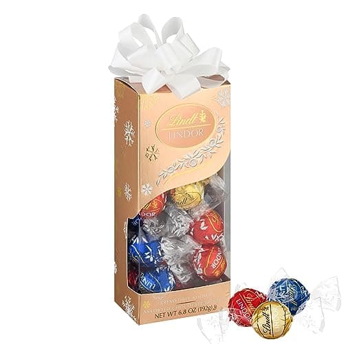 Best Lindt Chocolates #3 from Lindt Lindt LINDOR Assorted Chocolate Candy Truffles Traditions Gift Box, Assorted Chocolate with Smooth, Melting Truffle Center, 6.8 oz.